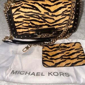 Michael Kors brown leather and gold with tiger felt print along with cc purse.
